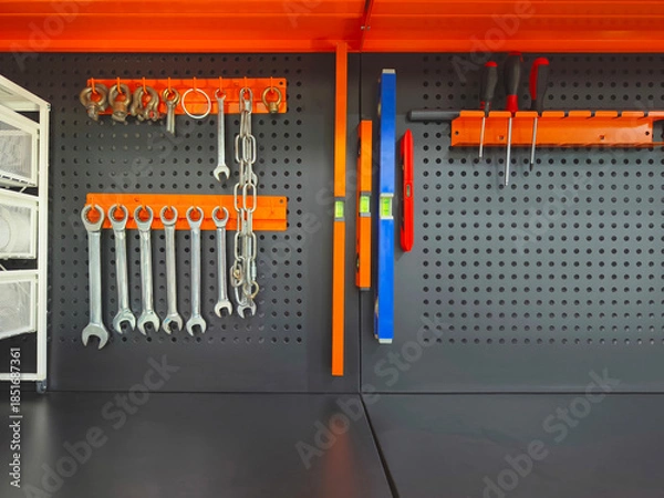 Obraz tool kit hanging on the stand wall