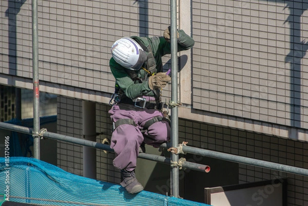 Obraz マンション解体現場の作業員