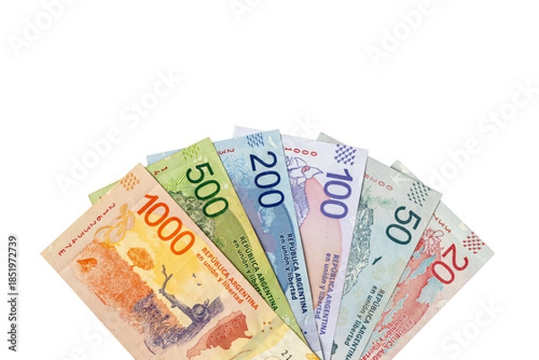 Fototapeta Argentine money. Paper banknotes, Argentinian peso bills arranged in a fan on a transparent background. Rewerse.  Financial business concept. Flat lay, copy space. Close up