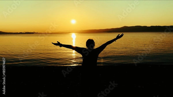 Obraz Person Standing Against Golden Sea Sunset