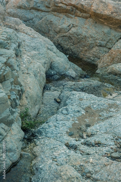 Obraz Rock formations with a little stream through it.