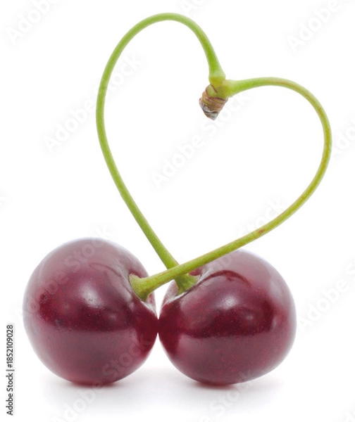 Obraz Two sweet cherries in heart shape isolated on white