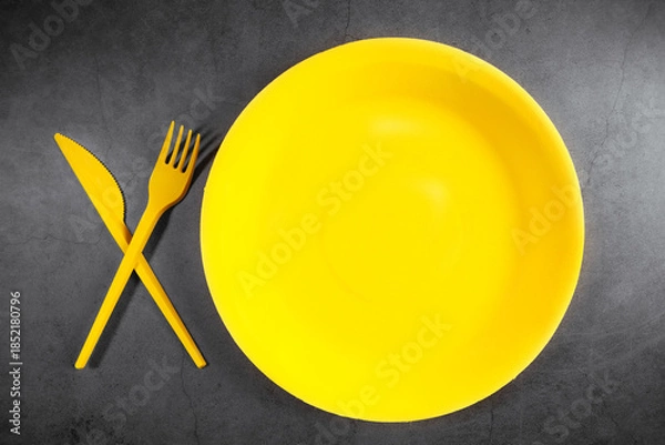 Obraz plate with cutlery on a white background