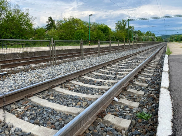 Obraz railroad tracks closeup at empty train platform