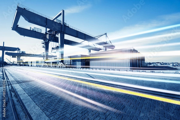 Obraz Terminal kontenerowy w nocy, praca w suwnicy mostowej.