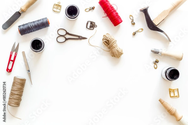 Obraz Leather craft work tools flat lay. Tailor or shoemaker on workplace, top view