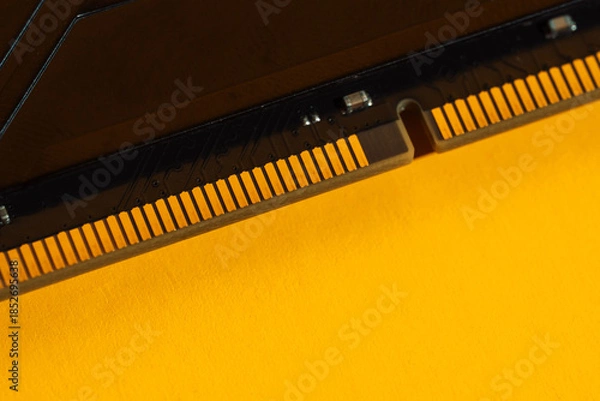 Obraz Row of RAM memory modules on bright yellow background. High quality photo