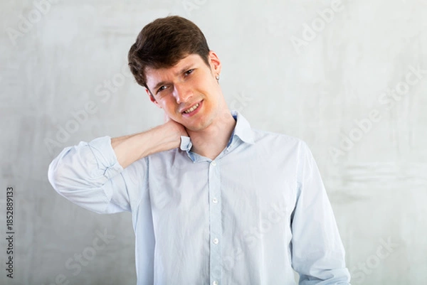 Obraz Man experiencing acute pain in his neck