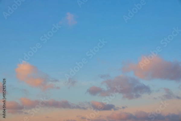 Obraz Beautiful blue sky with pink clouds at sunset.