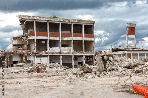 Obraz Demolition building after earthquakes or war. Deconstruction concept.