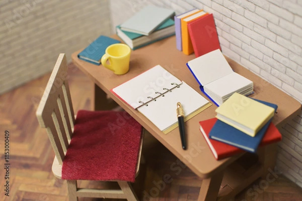 Obraz 開いたノートとペン　勉強中の机　宿題　メモ帳　参考書　本　ミニチュア