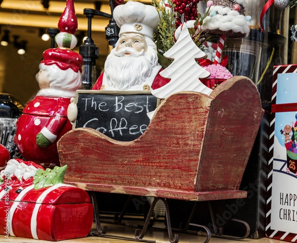 Fototapeta New Years window display with Santa Claus and a sleigh
