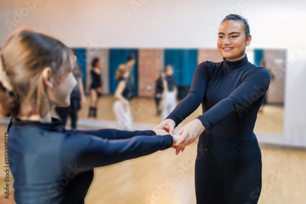 Obraz Dance instructor showing student dancing moves