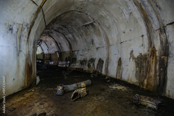 Fototapeta Dark tunnel at old underground bunker