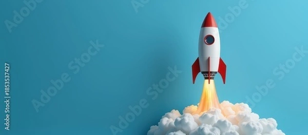 Obraz Rocket launching into a blue sky with clouds below.