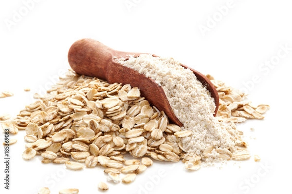 Obraz Pile of oat wholegrain flour in spoon