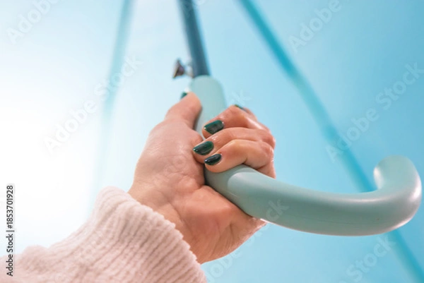 Obraz hand holding open umbrella, rain