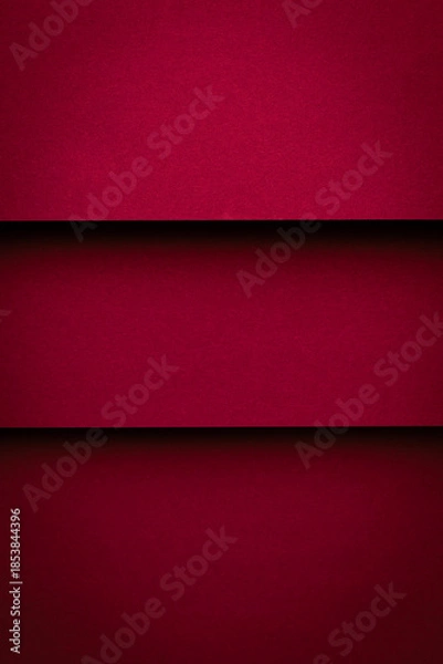 Obraz Red paper background with three horizontal strips creating a vibrant and bold design in a simple layout