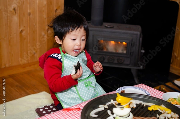 Obraz ホットプレートで食事中の子供