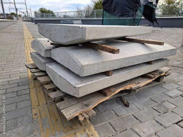 Obraz Concrete structures, blocks for supporting metal railings on railway platform