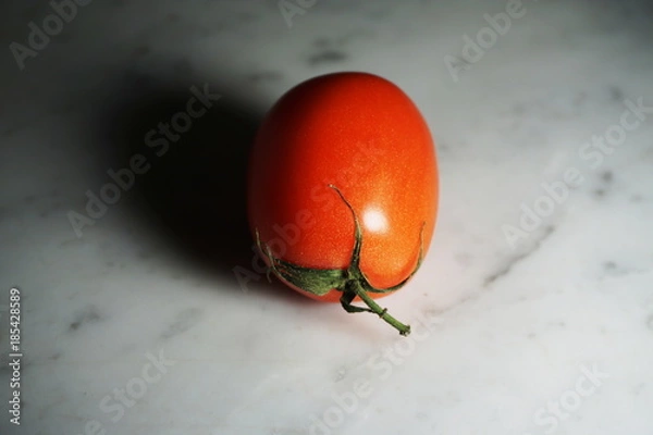 Obraz Isolated Tomato on White Marble Background