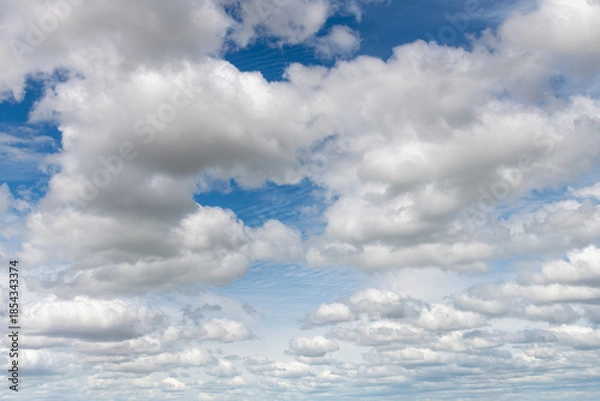 Obraz Cumulus clouds in the blue sky