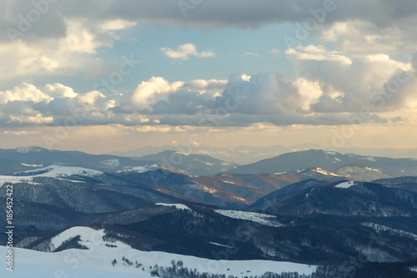 Fototapeta Soaring above the clouds - beautiful winter landscape on a mountain top