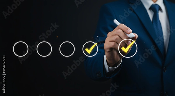 Obraz Man in suit selecting checkboxes with pen on virtual screen
