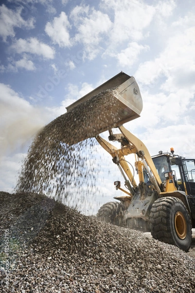 Obraz Excavator moving sand