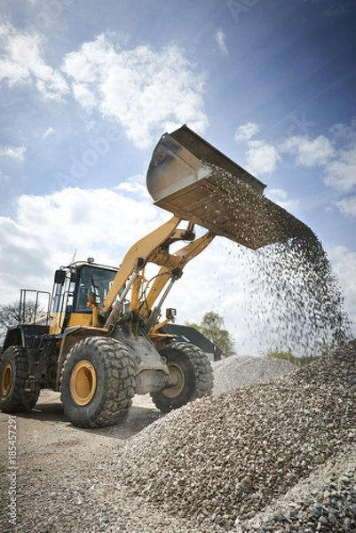 Obraz Excavator moving sand