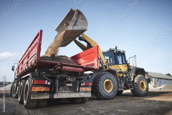Obraz Excavator moving sand