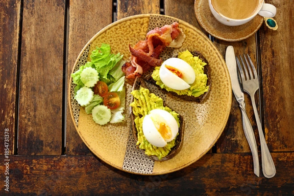 Obraz traditional breakfast with fried egg and salad
