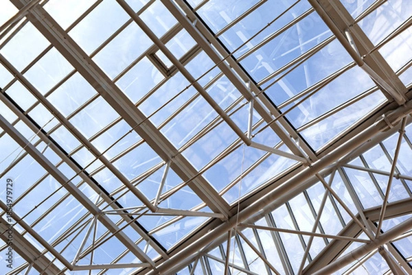 Fototapeta Building glass roof and blue sky on background