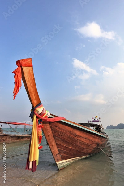 Obraz Bow is decorated with colorful  silk scarves