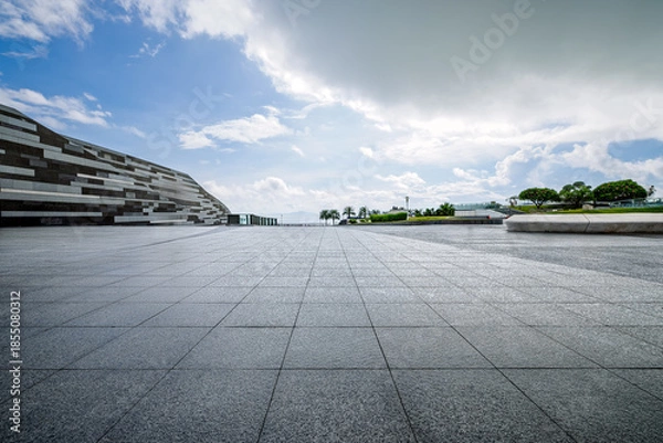 Obraz Empty square floor and modern architecture with blue sky background.
