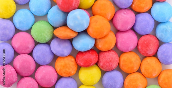 Obraz Colorful round dragee candies macro background
