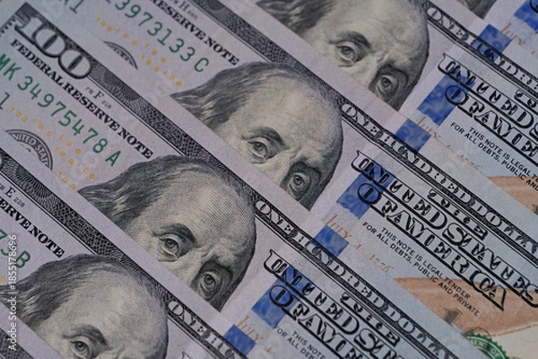 Obraz Hundred-dollar bills as background.