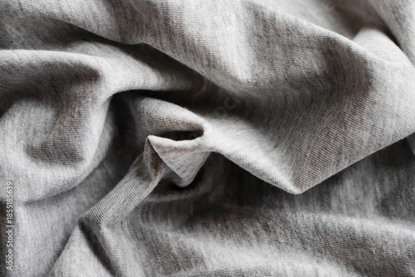 Obraz Dramatic lighting on denim fabric. Background, wallpaper.