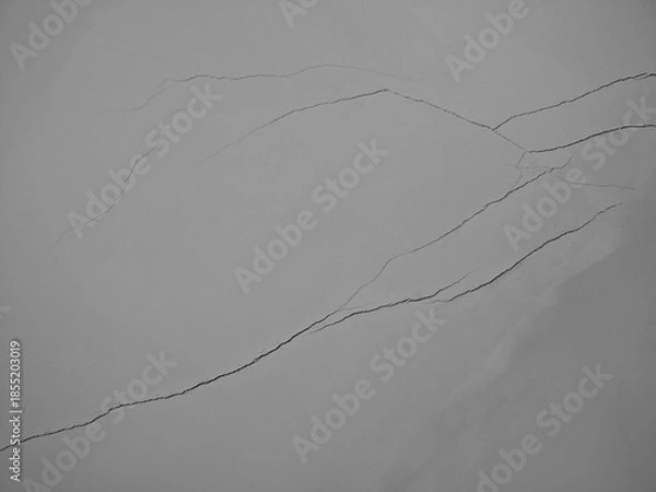 Fototapeta Diagonal cracks on the wall texture background