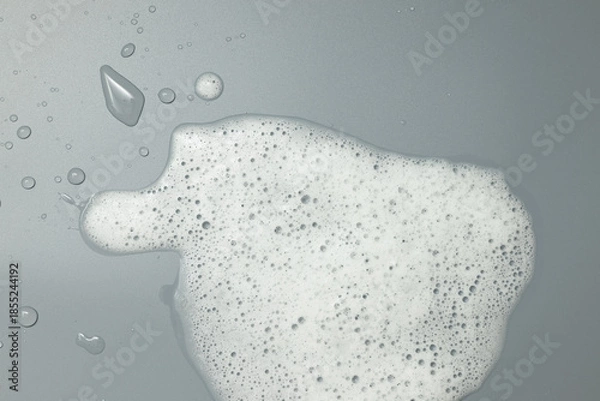 Obraz White foam on a gray background. Cleanliness concept.