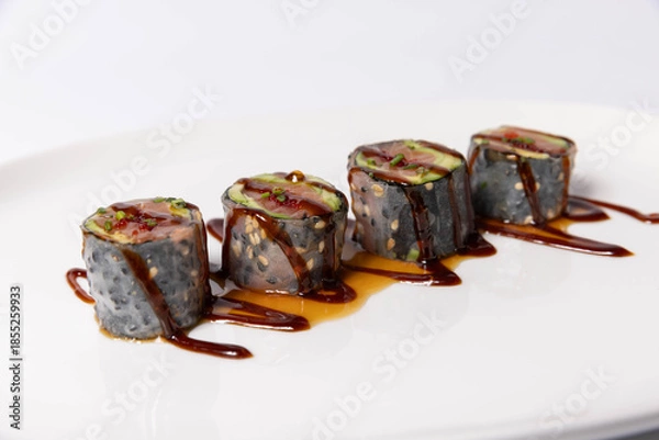 Fototapeta Sushi serving on white plate