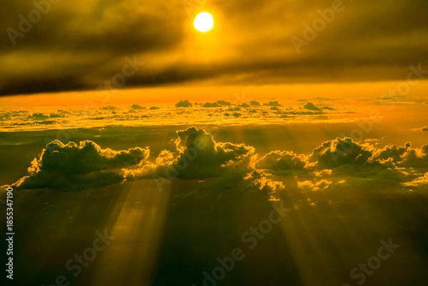 Obraz 雲間に差す夕陽の光