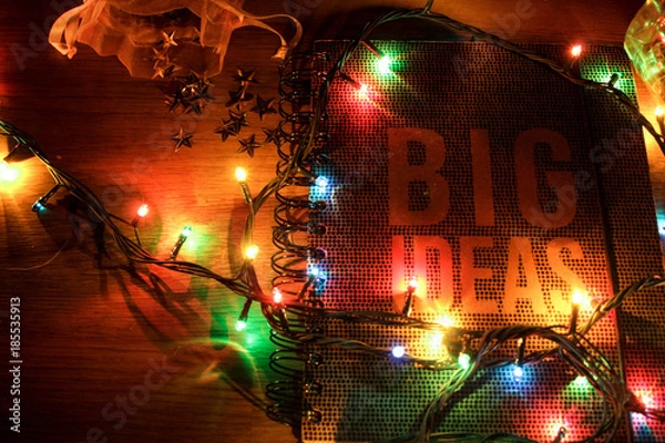 Obraz Christmas lights and notebook