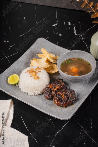 Obraz Traditional Indonesian Breakfast Meal with Rice and Soup.