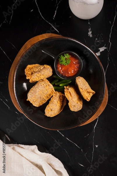 Obraz Breaded Fried Food with Red Sauce.