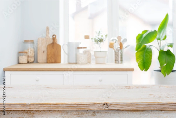 Obraz Bleached wooden tabletop on blurred kitchen counter background for product display and presentation
