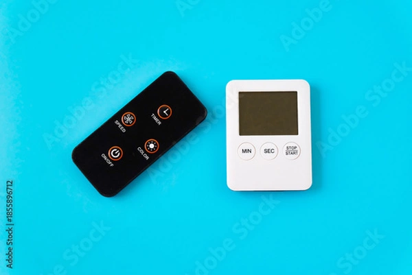 Obraz Mini Remote control on color background.