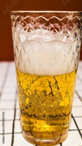 Obraz Glass of White Beer on Empty Tile Table. Beverage Indoor Closeup
