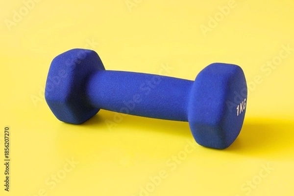 Obraz blue barbell on yellow background