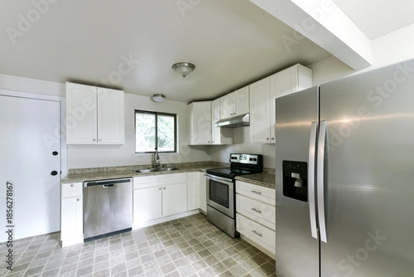 Fototapeta Modern residential kitchen interior